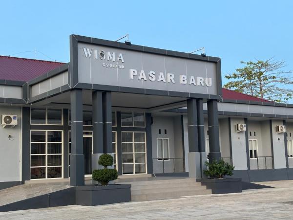 Wisma Syariah Pasar Baru, Забронировать  Отели West Sulawesi с парковкой, Парковка