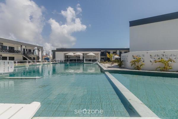 Aptos em condo. com churrasq. e piscina na melhor localização de Porto Seguro - DVBs, Забронировать  Отели Порту-Сегуру с парковкой, Парковка