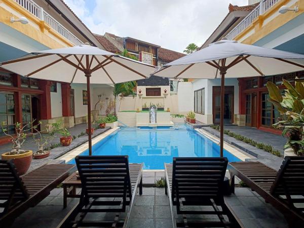 Natasya Suite Kuta Beach Hotel, Забронировать  Отели Куты с парковкой, рядом с Площадь Кута, Парковка