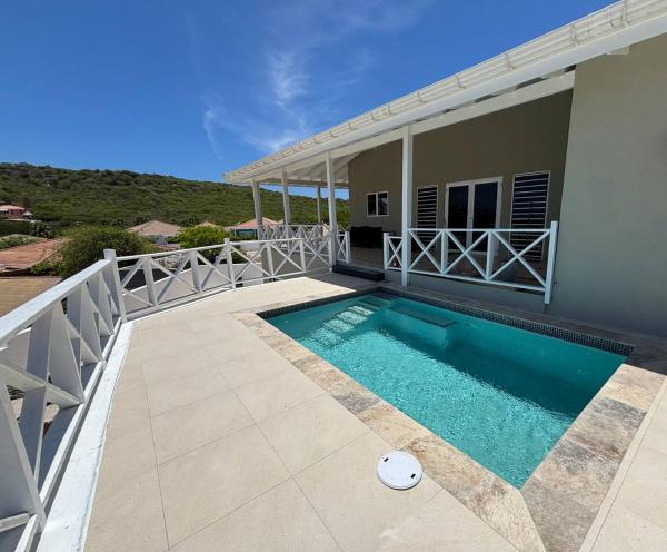 Luxe villa met panoramisch zicht en privézwembad, Забронировать  Фонтейн Кюрасао