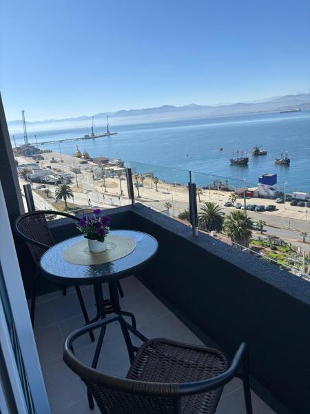 El descanso que mereces frente al mar, en un lugar nuevo en Coquimbo, Cuarta Región, Забронировать  Отели в центре Кокимбо, в центре
