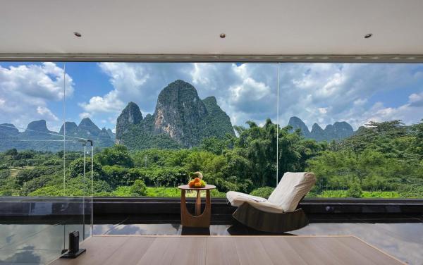 Riverside Bamboo Frest Hotel, Забронировать  Xingping Гуанси