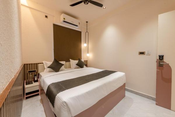 Legacy Inn, Mysore, Забронировать  Отели Майсура с парковкой, рядом с Chamundi Vihar Stadium, Парковка