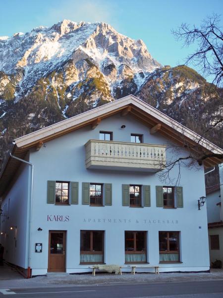 Karls Design Apartments Mittenwald, Забронировать  Миттенвальд Гармиш-Партенкирхен, рядом с Музей истории скрипок