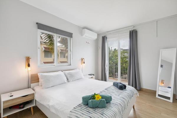 Amis Apartments Mauritius, Забронировать  Отели Кап-Малёрё с парковкой, Парковка