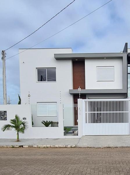 casa linda e confortável, Забронировать  Торрис Риу-Гранди-ду-Сул, рядом с Cal Beach
