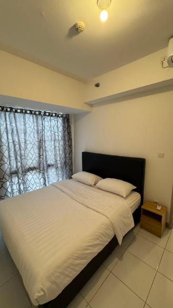 Cozy Minimalist Two-Bedroom Apartment by Jiu Zhai 九寨, Забронировать  Muara Banten