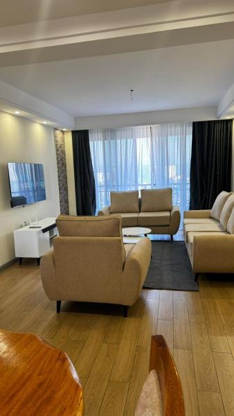 stunning two bedroom apartment with ample parking space swimming pool fully equipped gym and relaxing rooftop with city views, Забронировать Апартаменты/квартира Найроби Каунти Кения