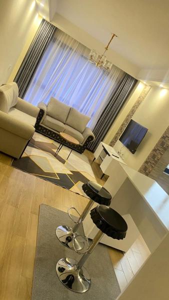 spacious executive one bedroom apartments with breathtaking city views swimming pool ,well equipped gym ,child playground and ample parking space, Забронировать Апартаменты/квартира Найроби Каунти Кения