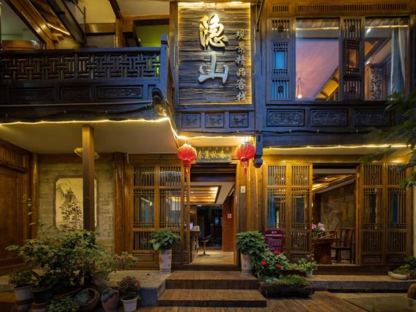Hidden Mountain Boutique Scenic Inn, Забронировать  Лицзян Юньнань
