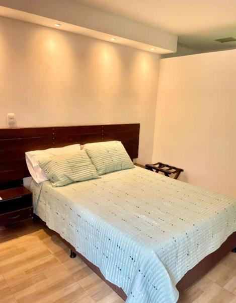 Hotel EL QUIMBO, Забронировать  Гарсон Уила