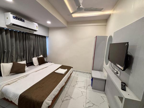 Hotel O by OYO B N Inn, Забронировать  Ambli Road Гуджарат
