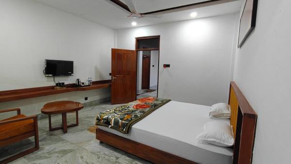 Apun Majuli Guest House, Забронировать  Маули штат Ассам
