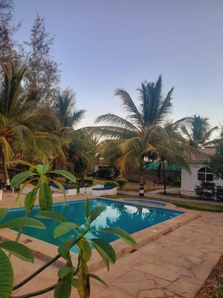 Villa Paradise, Забронировать  Отели Национального заповедника Shimba Hills с парковкой, Парковка