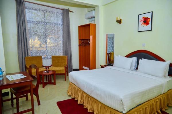 KiliCrane Lodge Arusha, Забронировать  Аруша Объединенная Республика Танзания, рядом с Old German Boma