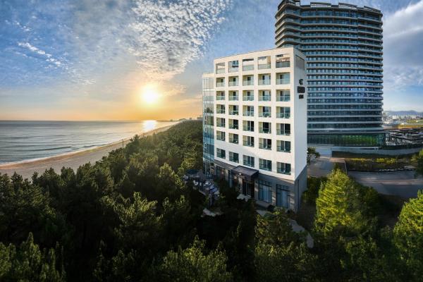 Hotel Hound Gangneung Gyeongpo, Забронировать  Отели Каннын с парковкой, Парковка