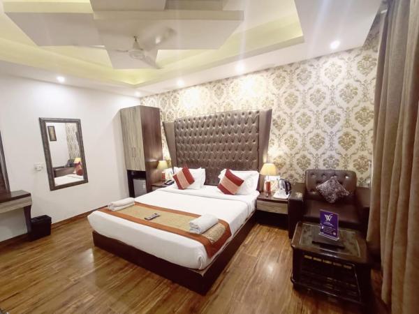 Hotel Waterfall Paschim Vihar Delhi, Забронировать  Пашим Вихар Нью-Дели