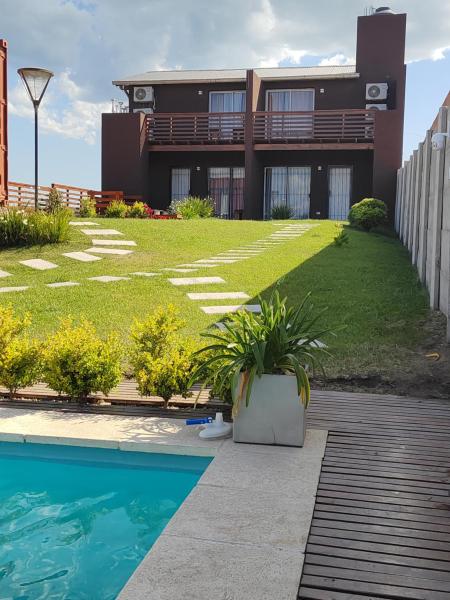 Duplex familiar con pileta en zona parque, Забронировать  Отели Атлантического побережья аргентины с парковкой, Парковка