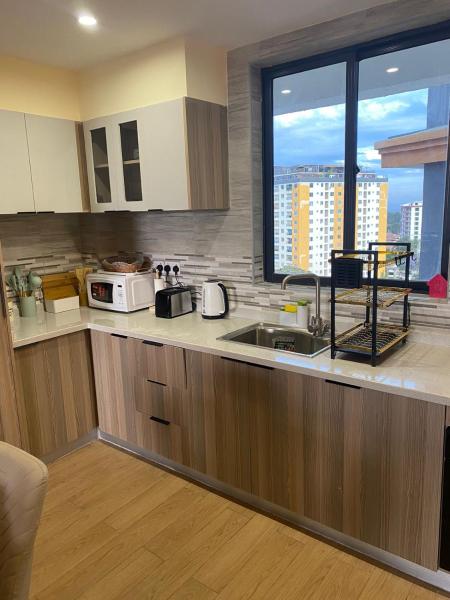 celestial suites apartment with heated swimming pool well equipped gym ample parking space children playing ground and relaxing rooftop with amazing scenic views, Забронировать  Найроби Руанда