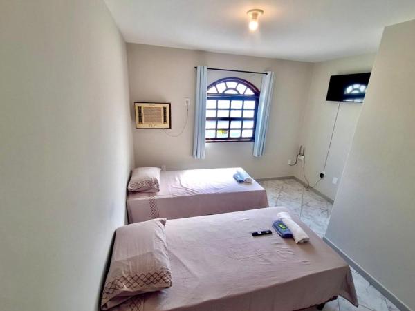 Quarto simples perto do Hospital Alvaro Alvim, Забронировать  Кампус-дус-Гойтаказис Lagos Region, рядом с Boulevard Shopping Campos Mall