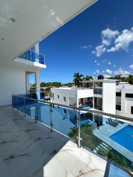 Tropical oasis rentas, Забронировать  Отели в центре Лас-Терренас, в центре, Парковка
