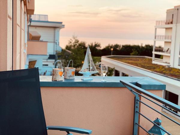 Villa Seeadler WE 23 Penthouse, Забронировать  Отели Мекленбург-Померания с парковкой, Парковка