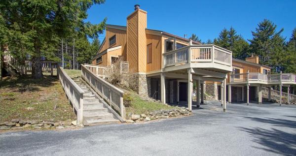 Wabasso 4 is gracefully tucked in the trees between Central Village & South Mtn