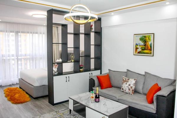 spacious furnished studio apartment in kileleshwa with unbeatable city views, Забронировать Апартаменты/квартира Найроби Каунти Кения