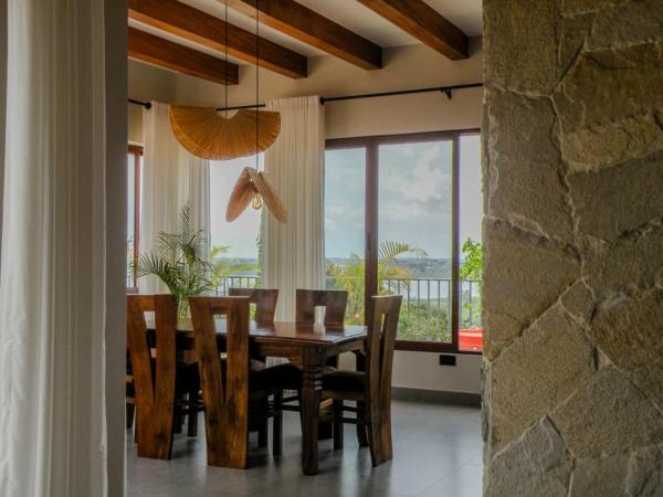 Stone Inspired Villa with an exquisite Lake View, Забронировать  Mutungo Джинджа
