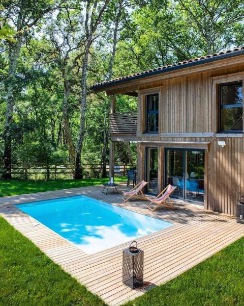 Villa 4 suites parentales-Piscine chauffée-climatisation-Moliets, Забронировать  Отели Аквитаний с парковкой, Парковка
