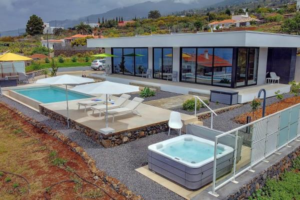Villa Relax mit beheiztem Pool und Whirlpool, Забронировать  Отели Тихарафе с парковкой, Парковка