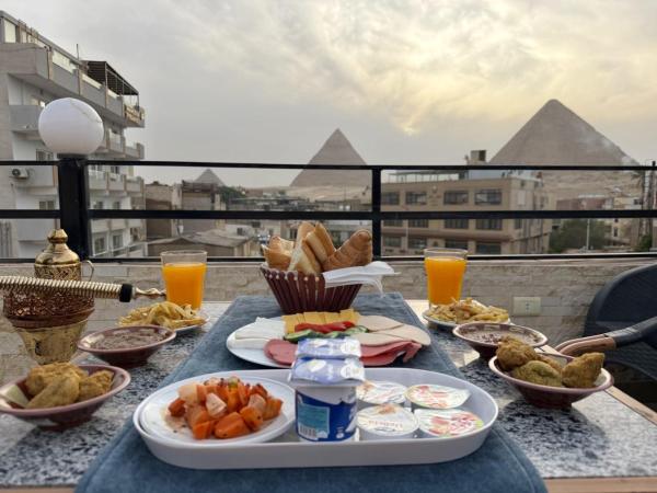 Luxury orienta Pyramids Inn, Забронировать  Каир Аль Каира
