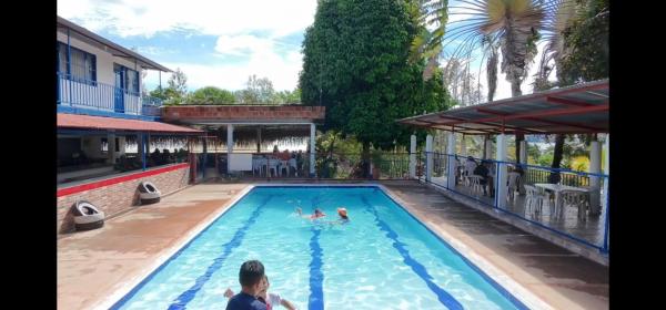 El Trapiche hospedaje y restaurante, Забронировать  Отели Прадо с бассейном, Бассейн