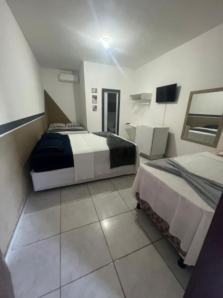 Suítes Rio Mar - Praia do Mutá - Staybeach, Забронировать  Отели Порту-Сегуру с парковкой, Парковка