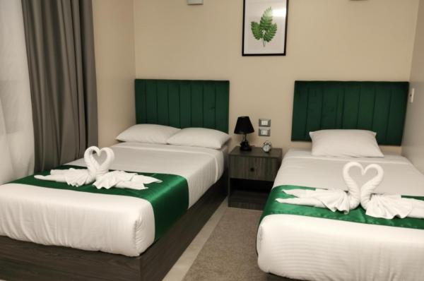 Cairo City Inn Hotel, Забронировать  Отели Каира с парковкой, рядом с Arab League HQ, Парковка