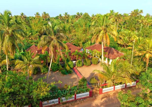 Secret Granary Alleppey by VOYE HOMES, Забронировать  Отели штата Кералы с парковкой, Парковка