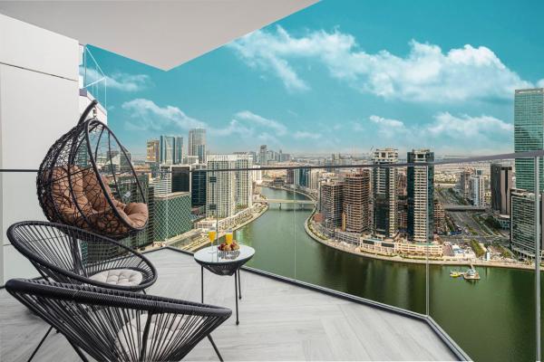 Peninsula Three Burj Khalifa & Canal Views, Забронировать  Дубай Эмират Дубай