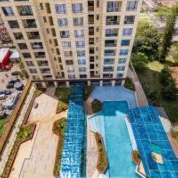celestial comfort apartments with ample parking space, swimming pool, modern equipped gym, and amazing city views, Забронировать Апартаменты/квартира Найроби Найроби Каунти