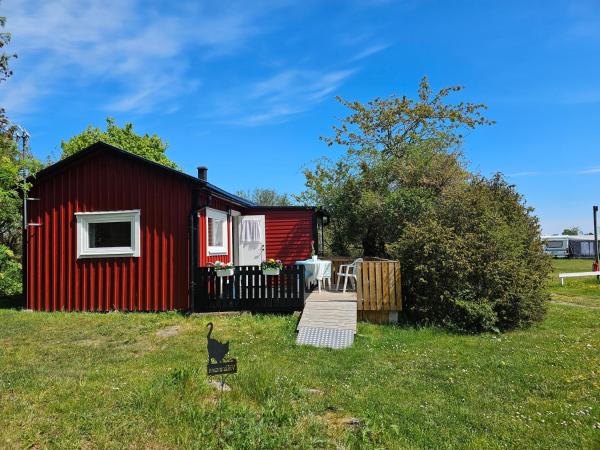 Stuga 11 Dalskärs camping, Забронировать  Отели Бергквара с парковкой, Парковка