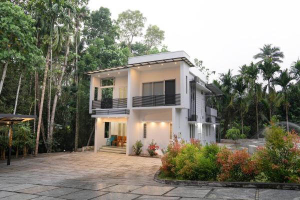 Villa at Muvattupuzha, Забронировать  Отели Муваттупула с парковкой, Парковка