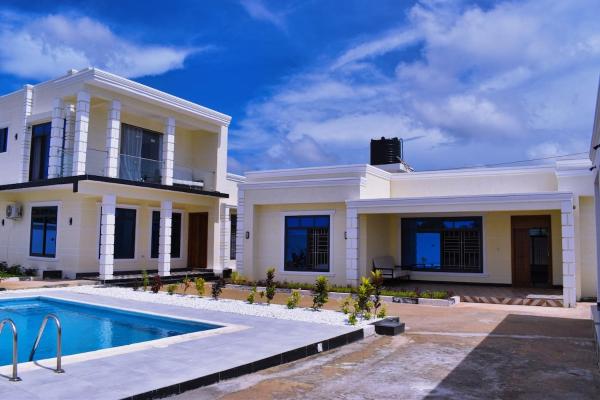 Cappuccino Luxury Villa & Homes, Забронировать  Mwombali Остров Занзибар
