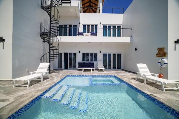 Villa Armoniosa Ocean View 2BR w/ Beachfront Pool - Upper Level, Забронировать  Пласенсиа Пласенсия