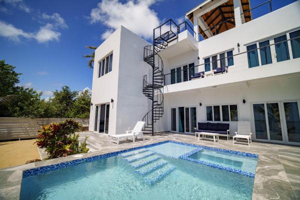 Villa Armoniosa Spacious Beachfront 2BR with Pool - Lower Level, Забронировать  Пласенсиа Пласенсия