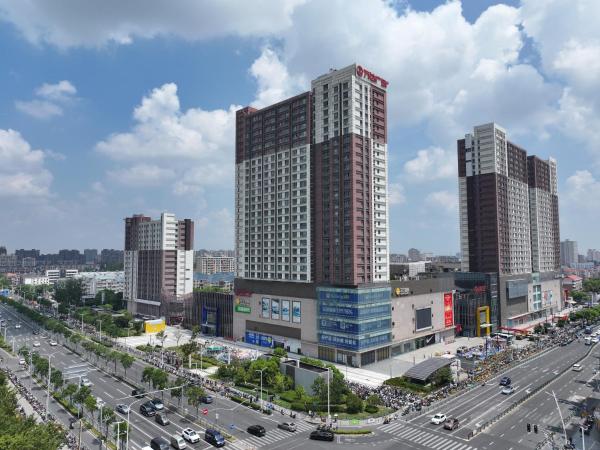 Huayue Apartment Hotel - Shanghai & Metro Line 18 Zhoupu Station华悦酒店上海浦东万达广场店, Забронировать Апартаменты/квартира Апартаменты Шанхая, Апартаменты/квартира