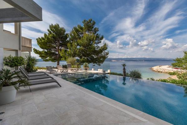 Seaside apartments with a swimming pool Medici, Omis - 25214, Забронировать Апартаменты/квартира Апартаменты Мимице, рядом с Пляж Туна, Апартаменты/квартира