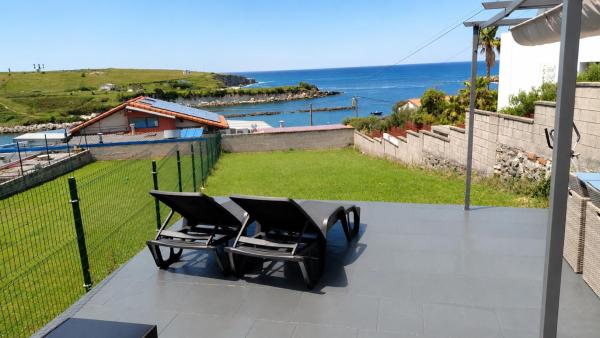 Villa en la playa con vistas al mar y jardín, Забронировать  Сантандер Cantabria Coast