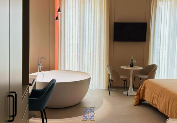 Passo Lento Charme Rooms, Забронировать  Отели Bari Province с парковкой, Парковка