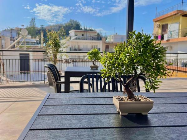 New Comfy and Sleek Apartments in the Center oF Athens, Забронировать Апартаменты/квартира Афины Острова Саронического залива - Аттика, рядом с Дафни