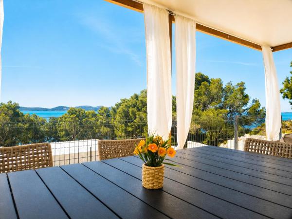 Sea view Mobile Homes Lumea & Aura, Забронировать  Отели Драге с парковкой, рядом с Пляж Бухта Дуговача, Парковка