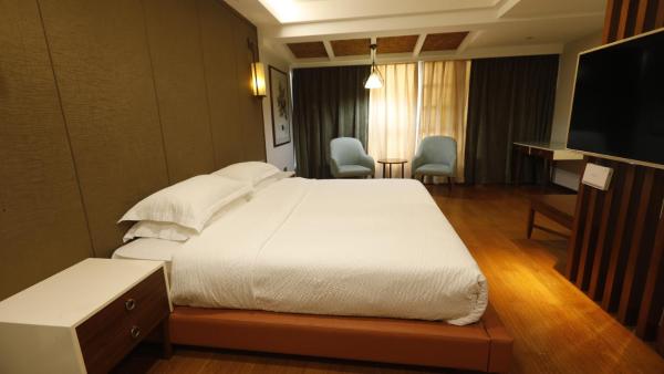 Rosie Lodge Hotel, Забронировать  Чжанцзяцзе Хунань